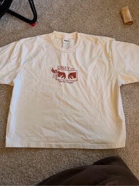 Obey Cream Tee with Maroon 'Be An Angel' Graphic